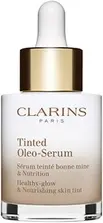 Тонизирующая масляная сыворотка с цветом Clarins