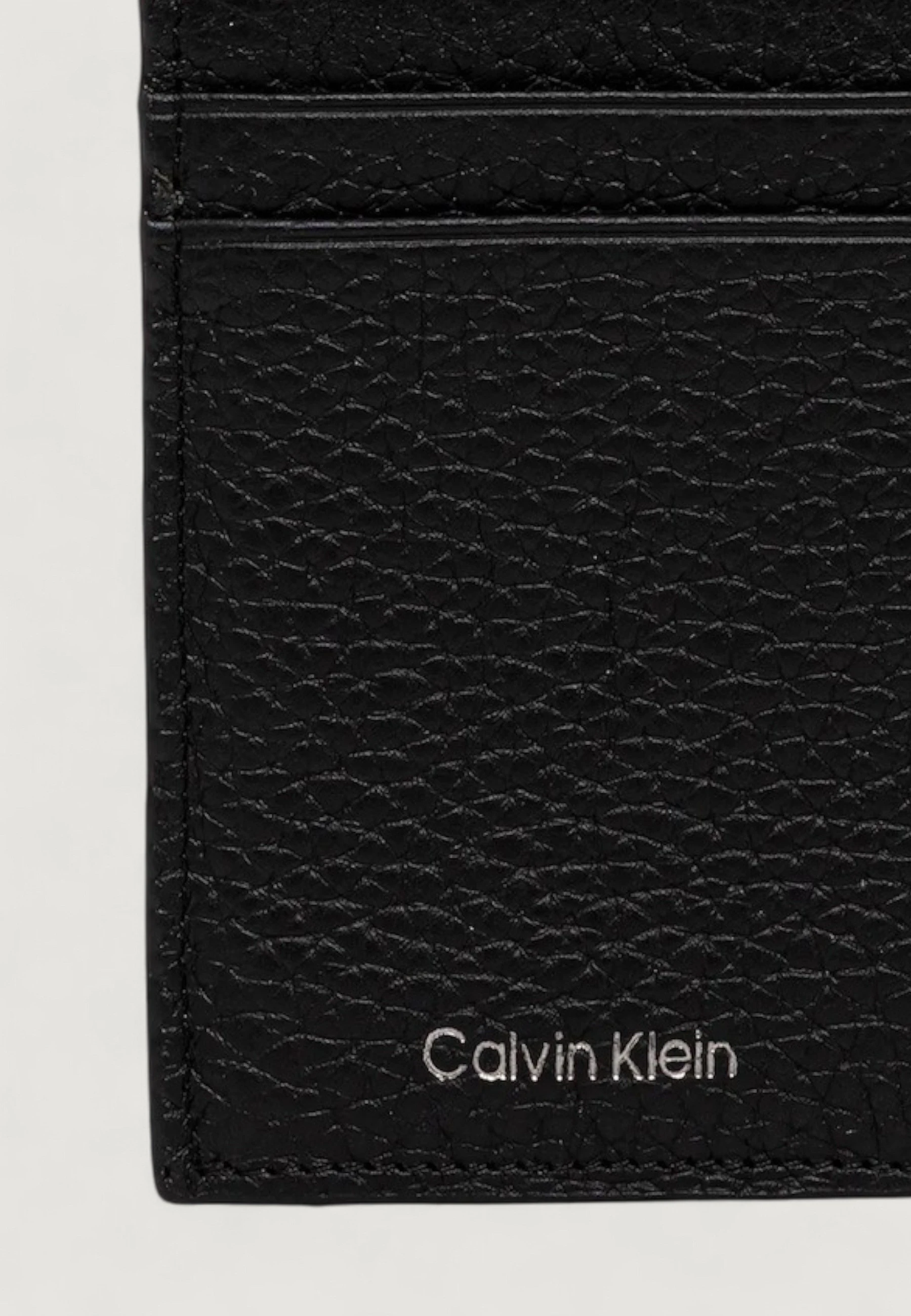 Кошельки Calvin Klein