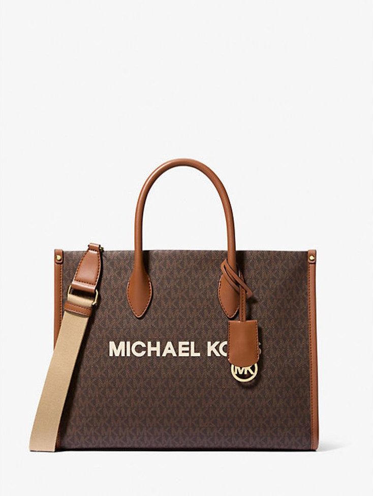 Коричневая сумка через плечо из меха Michael Kors