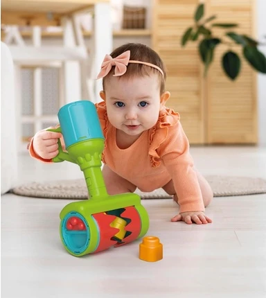 Развивающая игрушка Clementoni Clemmy "Сенсорный пылесос-ролик" с мягкими кубиками и регулируемыми элементами